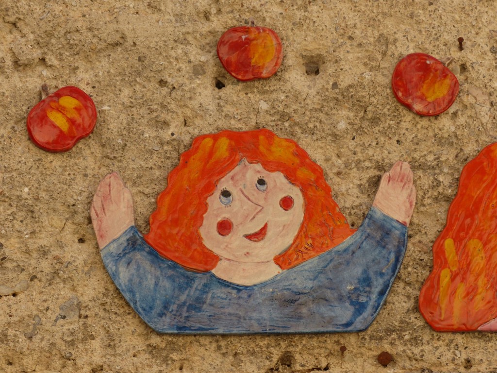 Girl Juggling Apples